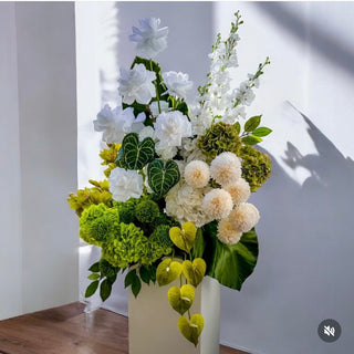 Modern-artificial-flowers-florist-Christchurch-plinth-arrangement-green-white