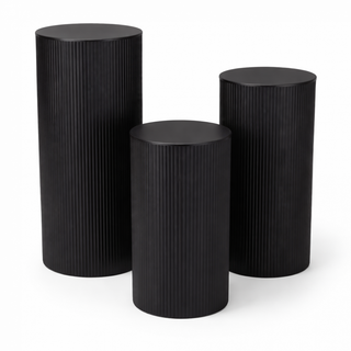 Three black cylindrical rippled plinth stands for birthdays, weddings, parties, corporate events